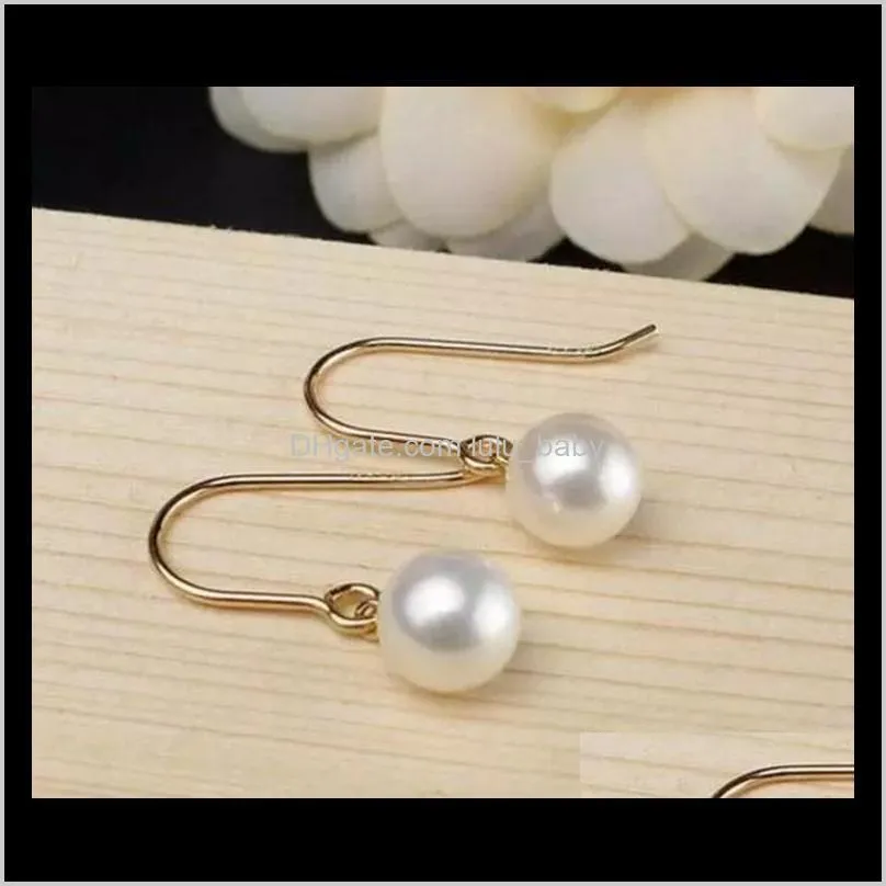 a pairs of 8-9mm round natural freshwater pearl earrings 14k gold accessories