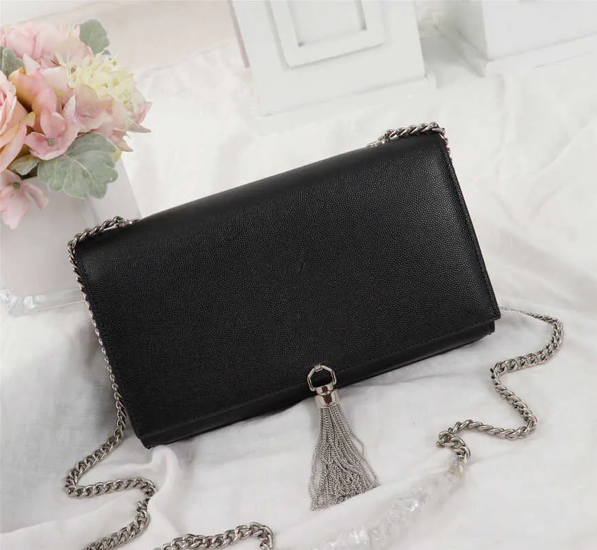 Väska gjord i riktigt läder svart silver guldkoppling handväska handväska tofsar högkvalitativa kvinna axelväska serienummer plånbok
