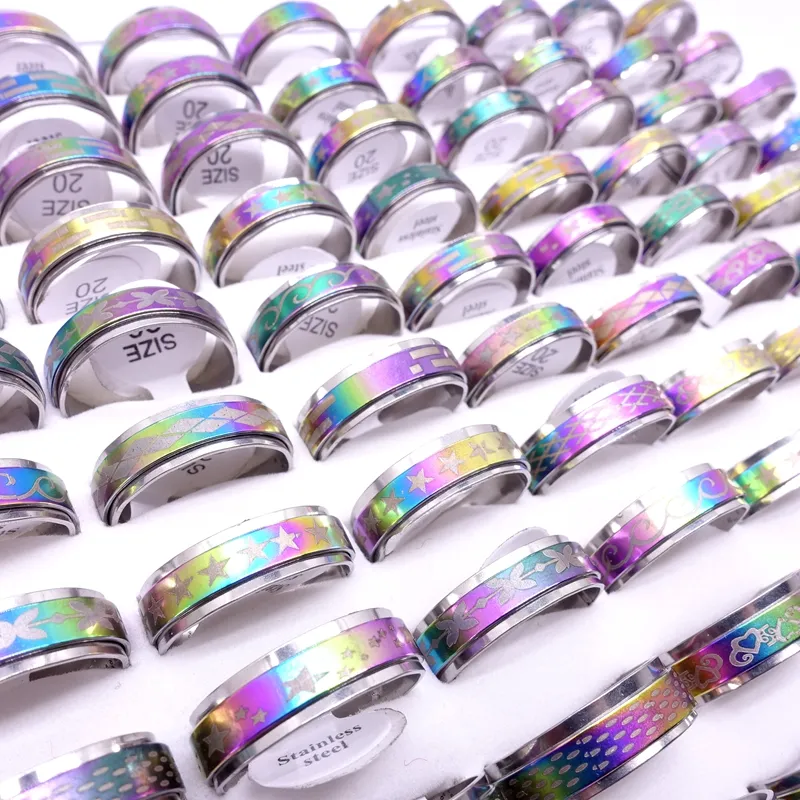 Wholesae 100PCs / Lot Anneaux De Bande De Spin En Acier Inoxydable Rotatif Multicolore Laser Imprimé Mix Patterns Bijoux De Mode Spinner Party Gift