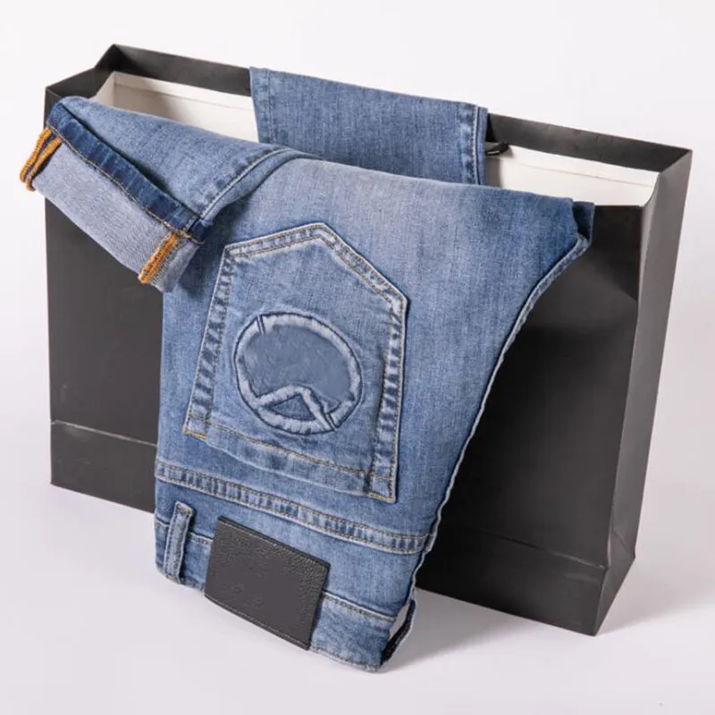 Storlek 28-38 mens sommar jeans streetwear hip hop ljusblå hål rippad stretch tide designer denim skinny byxor för män