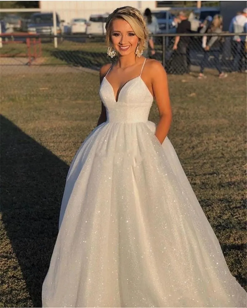 Bohemian Plus Size a line wedding dress with Spaghetti Straps, V-Neck, and Sweep Train - Beach Style Bridal Gown with Pockets Bohemian Plus Size a line wedding dress with Spaghetti Straps, V-Neck, and Sweep Train - Beach Style Bridal Gown with Pockets