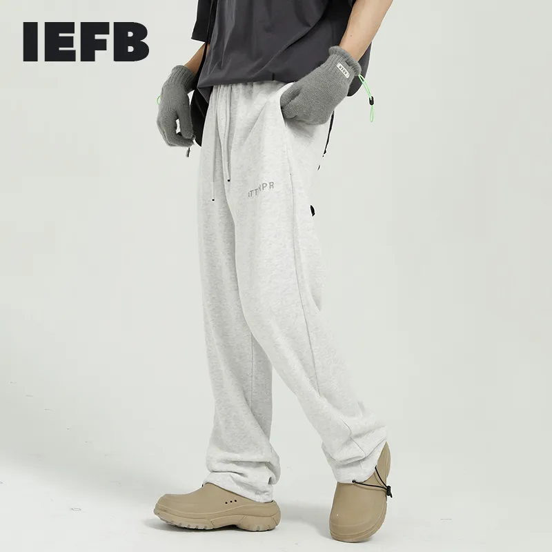 IEFB Mäns Slitage Vår Blå Byxor Koreanska Trend Enkel Elastisk Midja Bandage Bottom Brev Black Grey Causal Trousers 210524