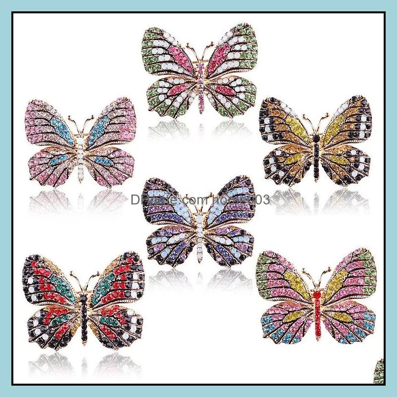 Broches Jewelryfashion Colorf Papillon Broches Métal Cristal Strass Découpe Broche Animal Pins Banquet Bouquet De Mariage Cadeaux Drop Delive