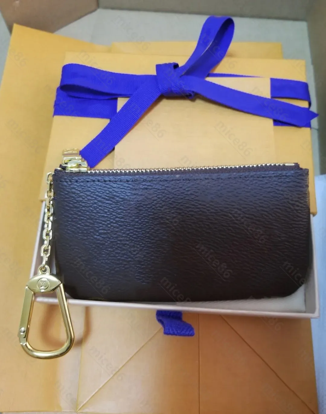 最高品質の本物の革の財布財布ホルダールクソリのデザイナーファッションハンドバッグメンズ女性カードホルダーブラックラムシンmin200k