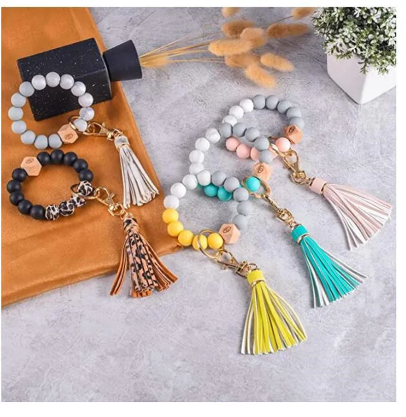 Wood Beads Bracelet Keyring Women Girl Favor bead wrist key chain Silicone Keychain For Keys Tassel Handbag Car Charms Pendant Jewelry Party Gift Key ring