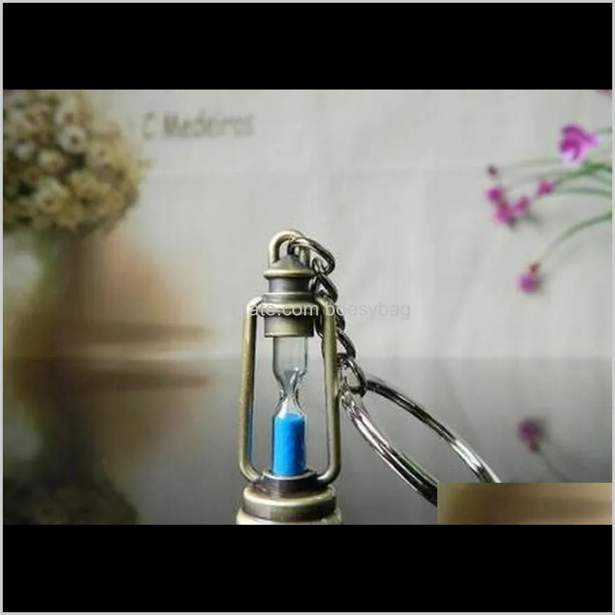 metal lamp shaped timer hourglass keychain sandglasses novelty item guft for woman and men timer hourglass keychain sandglasses