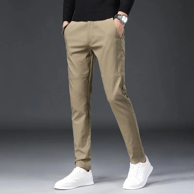 Męskie spodnie garniturowe Formalne Mężczyźni Dresss Spodnie Odzież Korea Styl Slim Elastyczna Talii Biuro Klasyczny Letni Spoder