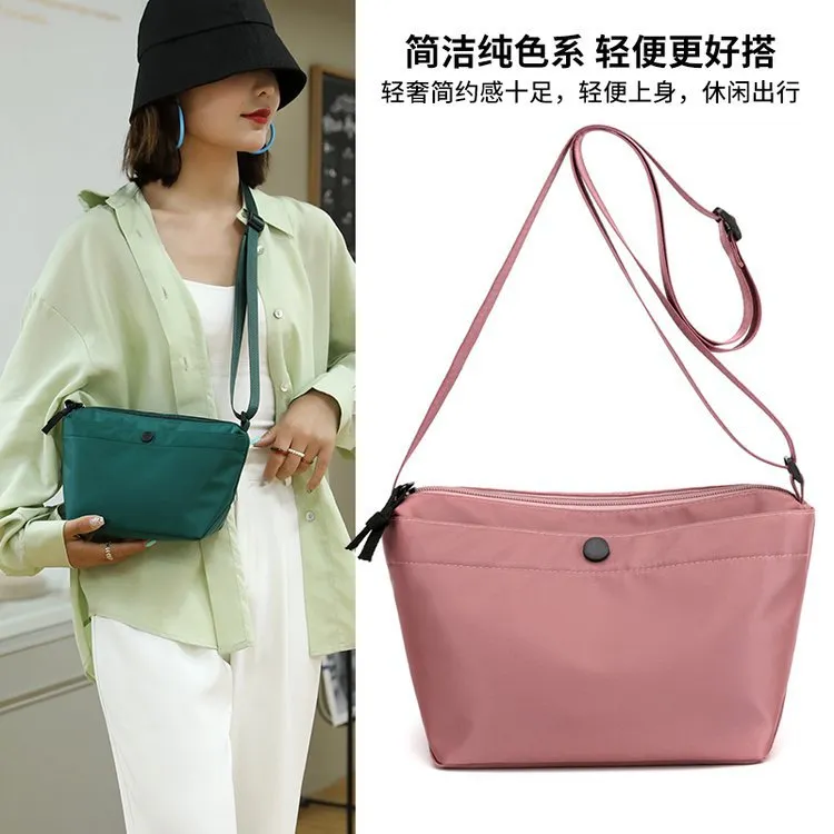 Neue Stil Frauen Tasche Casual Nylon Tuch Handtasche Mode Umhängetasche Einkaufen und Tourismus Kleine Runde Messenger