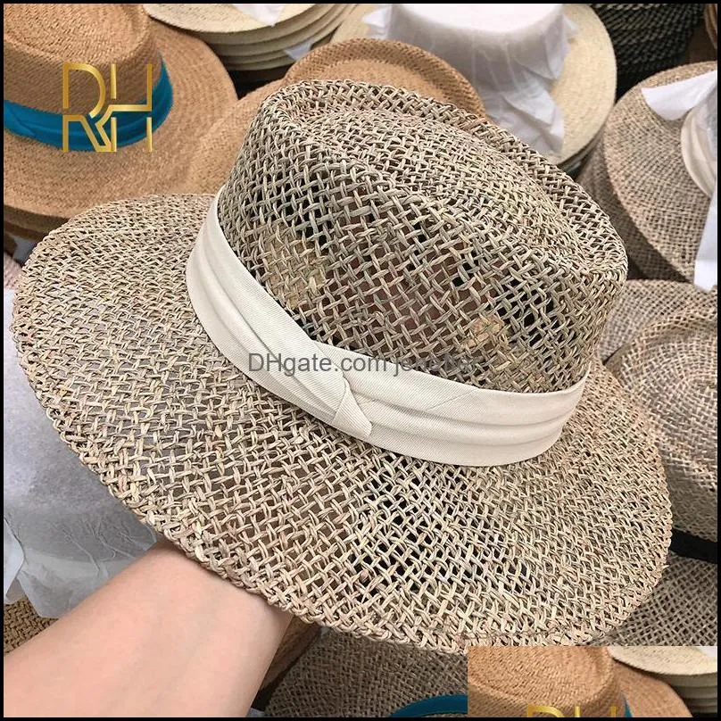 Travel Natural seagrass hollow flat brim hat ladies summer porkpie concave round sun hat beach straw hat with ribbon wholesale Y0910