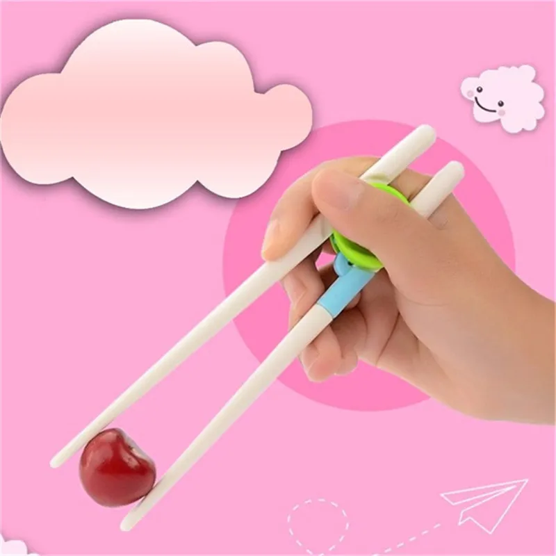 1Pair barn lärande träning ätpinnar barn baby lärande för barn kinesisk chopstick lärare gåvor