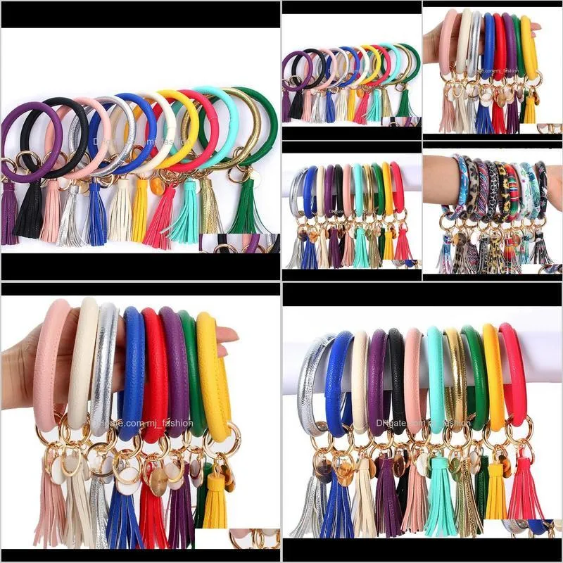 big customer discount pu leather tassel sunflower bracelet keychain leopard sunflower cactus round leather tassel bangle key ring 2257