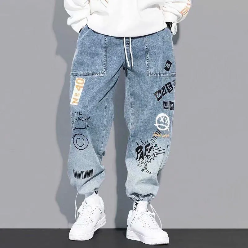 Mens Jeans Outono Letra Impressa Maré Marca Solta Dos Desenhos Animados Graffiti Calças Com Cordão Homens Streetwear