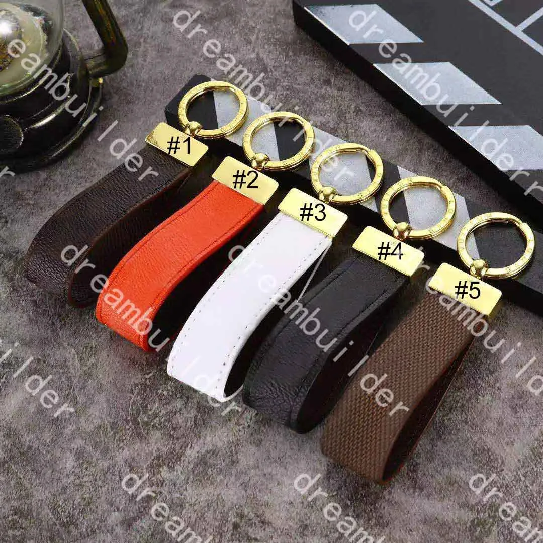 M65221 Stilista di lusso con cinturini fatti a mano in pelle PU Car Keychain Women Bag Charm Pendant Accessories