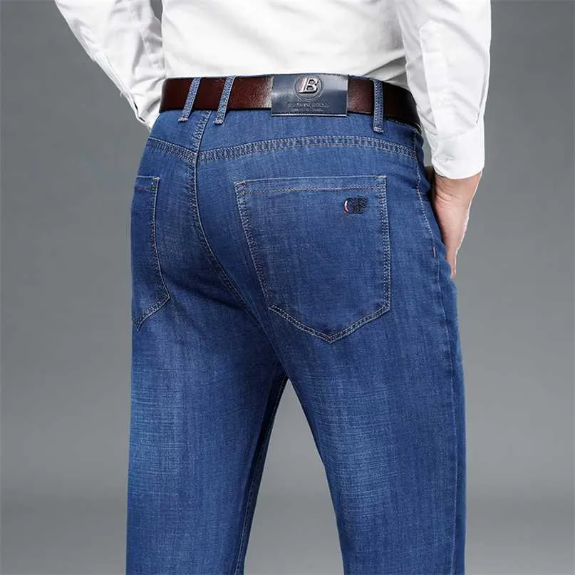 Męska komfort rozciągliwy denim jeans lato proste cienkie slim fit biznesowe casual classic spodnie 211108