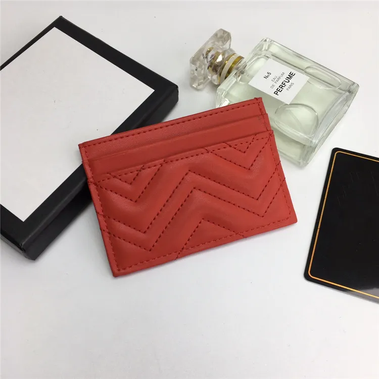 Lady`s card bag. It is made of calf leather, quilted figure pattern and top overseas hardware. With packing box, free delivery