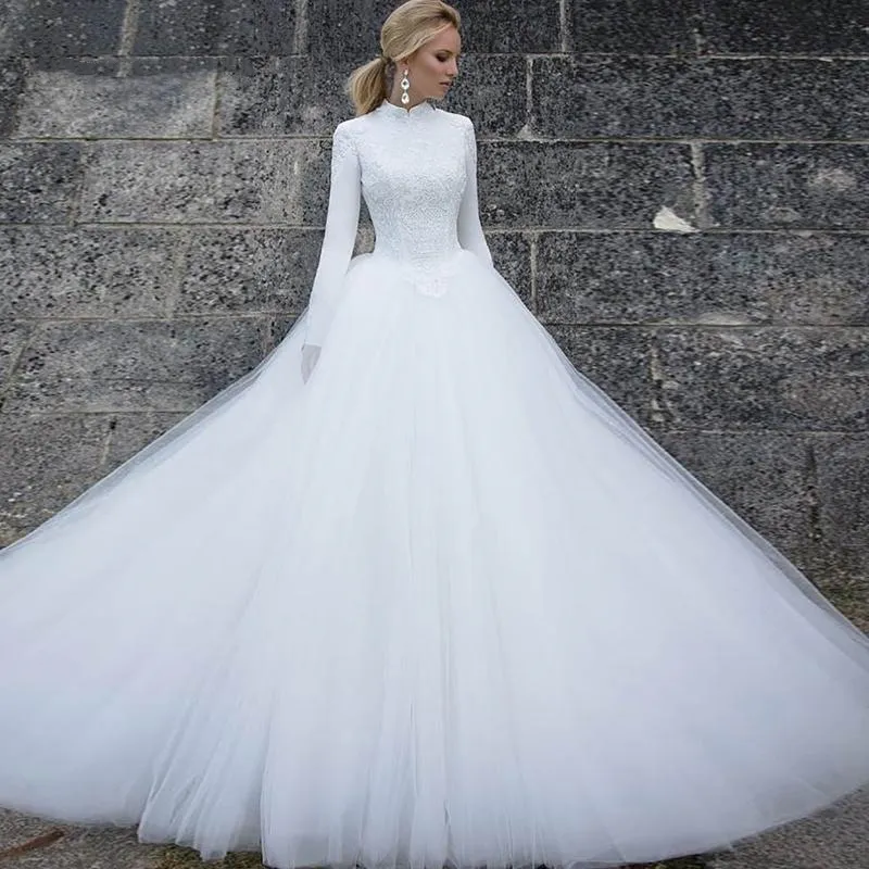 Modesto musulmano A Line Abiti da sposa Abiti da sposa Collo alto Manica lunga Appliques Pizzo Bianco avorio Tulle Inverno Sposa Abito formale 2021 Vestidos