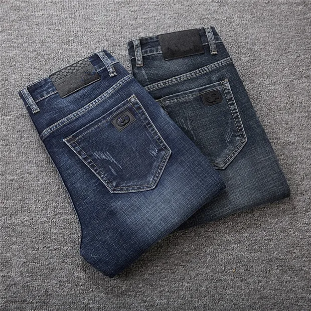 Высококачественные мужские джинсы дизайнерские роскошки светло-серый синий цвет огорченный бизнес повседневная молодая одежда мужчина джинсовая рок тонкий нога подходит отрывая отверстие полоса известные брюки W40