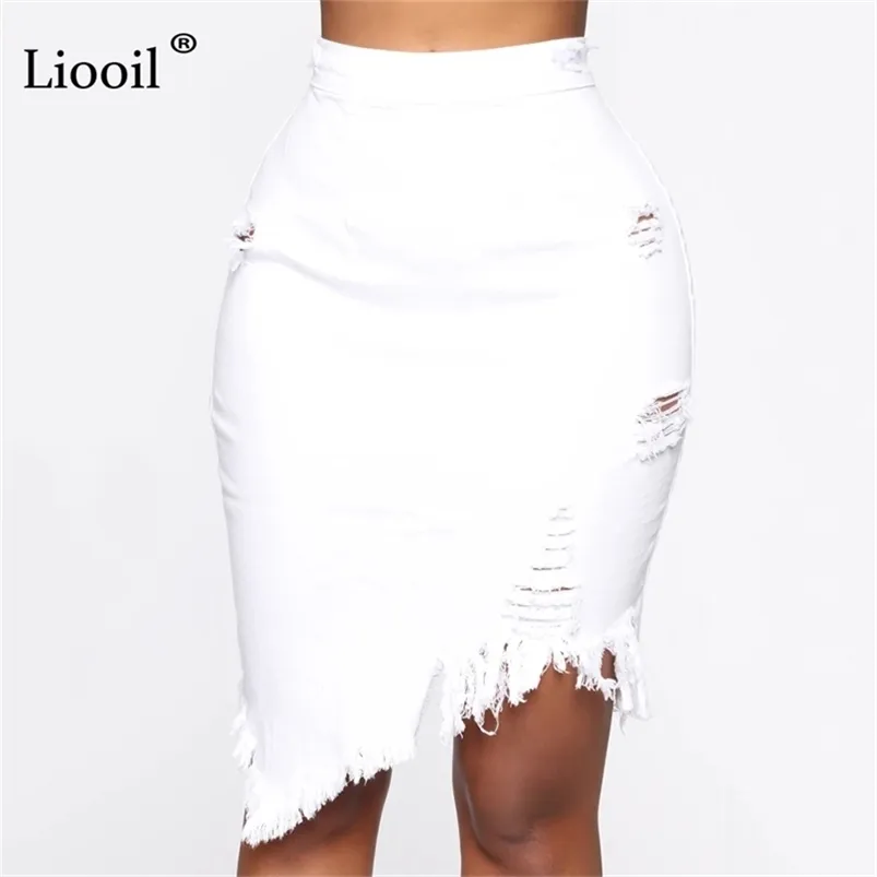 Liooil asymétrique coton noir blanc trou Denim jupe mi-longue avec gland Streetwear taille haute lavage en détresse femmes jupe moulante 210401