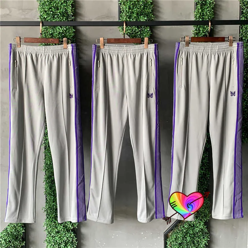 Серые иглы отслеживают брюки мужчин женщин бабочка вышивка иглы брюки фиолетовые боковые полоса спорты свободные прямые брюки x0628