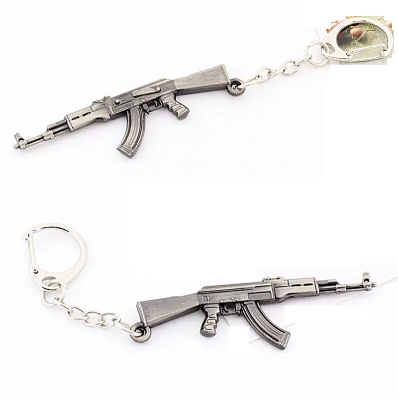 Novidade arma arma keychain cf ak47 arma de arma pingente cadeia chaveiro chaveiro anel para homens presentes tamanho 6cm