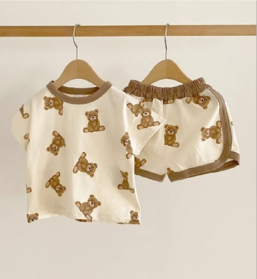 2021 милый ребенок летняя одежда наборы одежды мультфильм медведь детей с коротким рукавом футболка + шорты 2 шт. Установить домашнюю одежду малыша хлопок повседневные костюмы младенческие наряды детей пижамы