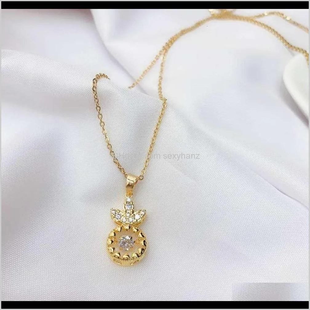 pendant real gold color and copper micro inlaid round diamond four claw beating heart flower crown temperament women`s trendy clavicle