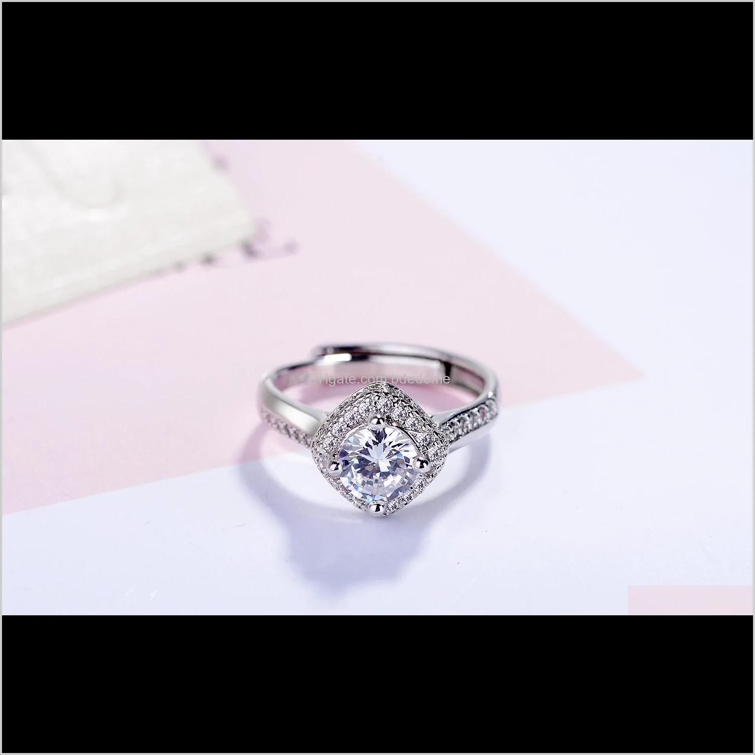 brass ring with white bigger size zircon around small setting imitation rhodium plated woman gift adjust circle size