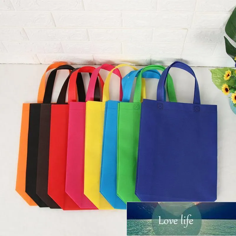 Cadeau cadeau 10pcs sacs fourre-tout multi-usages enfants fête d'anniversaire faveur non-tissé traiter couleur unie avec poignée sac à provisions Ba1 prix d'usine conception experte qualité dernier style