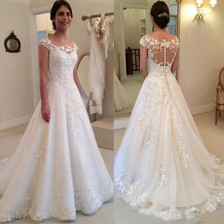 High-Quality Sheer See-Through short sleeve wedding dress with Illusion Back Cap Sleeves, Lace Appliques, and Covered Buttons - 26 Collection (Vestido
