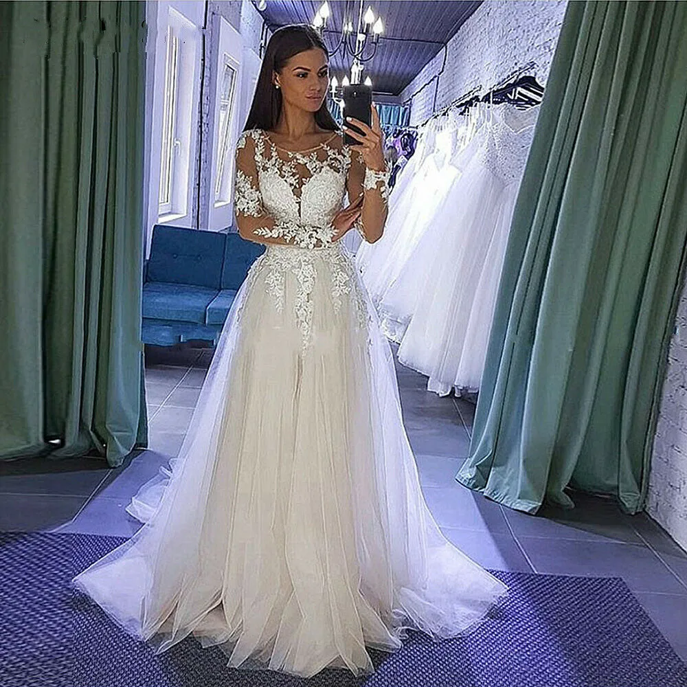 Abiti da sposa in tulle di pizzo maniche lunghe applicazioni scollo rotondo abito da sposa da spiaggia