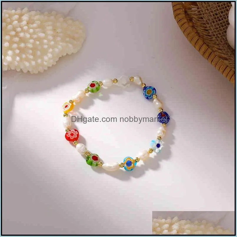 Daisy elastic hand String Bracelet girl`s sense of elasticity adjustable small and lovely handmade colored glass freshwater pearl