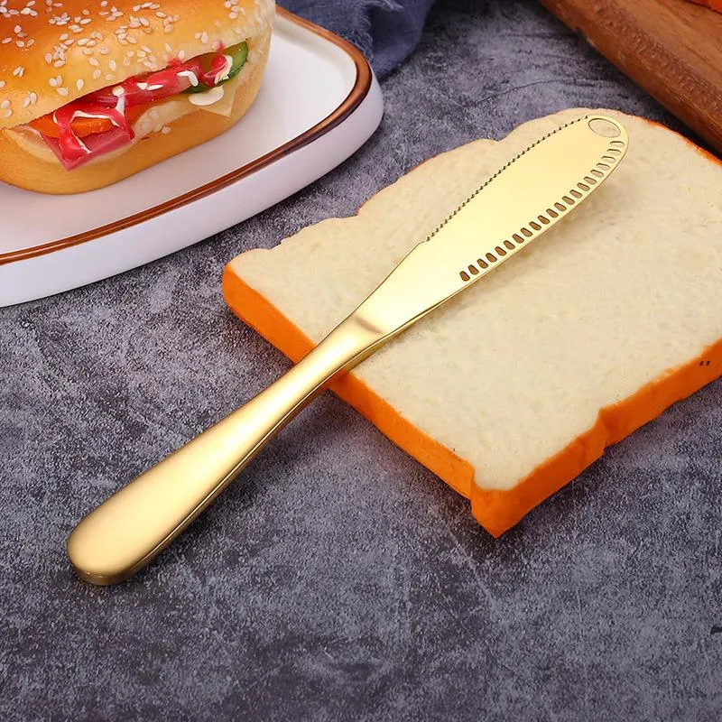 Épandeur de beurre multi-usage avec couteau à beurre en acier inoxydable Fentes de déchiquetage à bord dentelé Facile à tenir pour le pain, le beurre, la confiture de fromage JJE10533