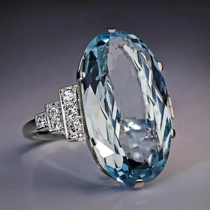 Huitan – bague de mariage bleu ciel clair pour femmes, bande Solitaire, pierre ovale, fête de fiançailles, bijoux de luxe, pierre CZ brillante, meilleur cadeau