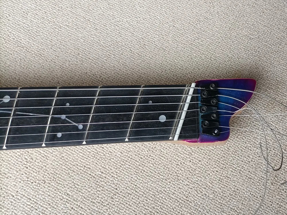 ヘッドレスギターネック 7 弦エレキギター: ファンフレット、エボニー