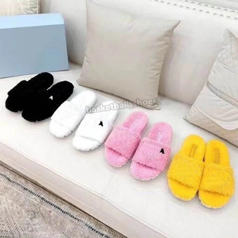 Luxurys Dames Wollen badstof dia's Slippers Zachte platte elektrische borduurmuilezels met echt leer Zwart wit roze geel harige schoenen