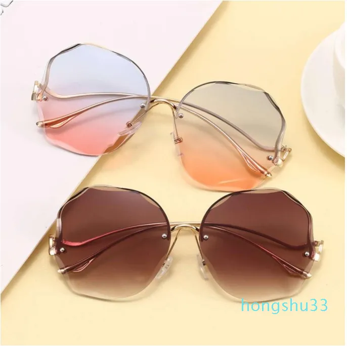 Sunglasses2020 Metal moda feminina sem aro recortar líquido vermelho óculos de sol