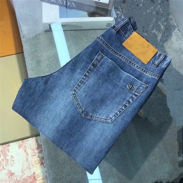 Mens Jeans Designer Luxurys Designe Calças de Algodão Lightweight Patch Afligido Slim-Lareira Moda Casual Rua Reta Empresarial Lazer 29-38