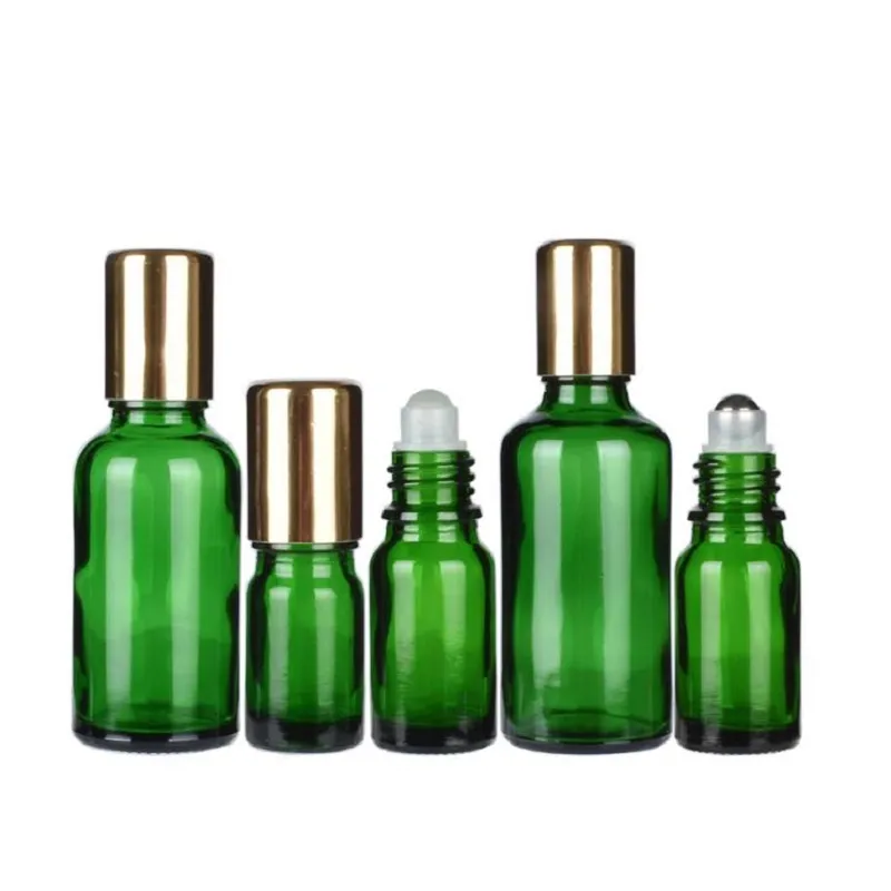 Rouleau vide sur bouteille 5 ml 10 ml 15 ml 20 ml 30 ml 50 ml 100 ml Emballage cosmétique en verre vert portable Flacons d'huile essentielle Rouleau en acier avec billes de verre avec capuchon doré brillant