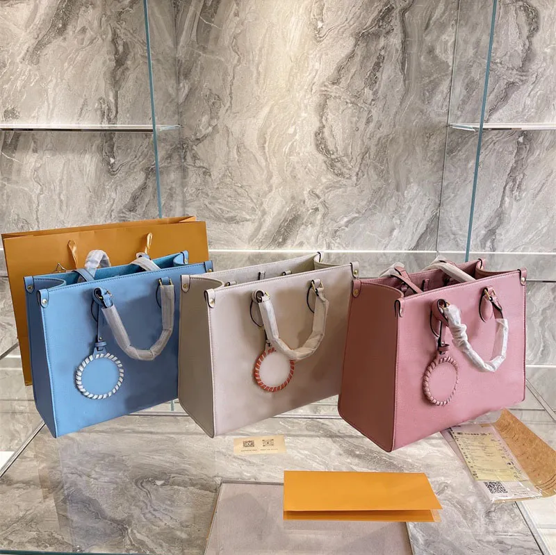 Bolso de mano de alta calidad para mujer, bolso de mano versátil de gran capacidad, de diseñador de lujo, bolsas de compras simples y generosas, 2021