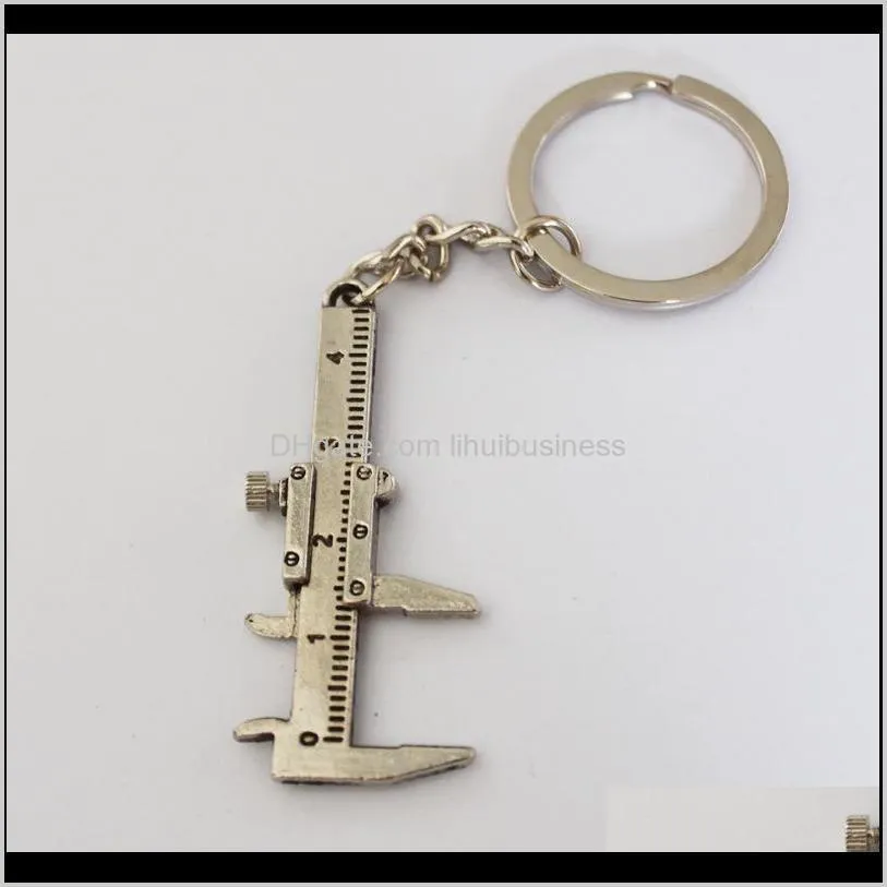 Keychains Fashion Aessory Ankomst Movlig Vernier Caliper Ruler Model Keychain Metal Pendant Key Chain Chaveiro C Kole4