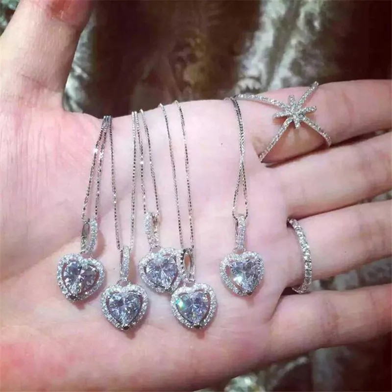 Ins Top Venta Colgante de corazón Joyería de lujo Plata de ley 925 auténtica Corte de pera Topacio blanco CZ Diamante Piedras preciosas Fiesta de la suerte Mujeres Boda Collar de clavícula Regalo