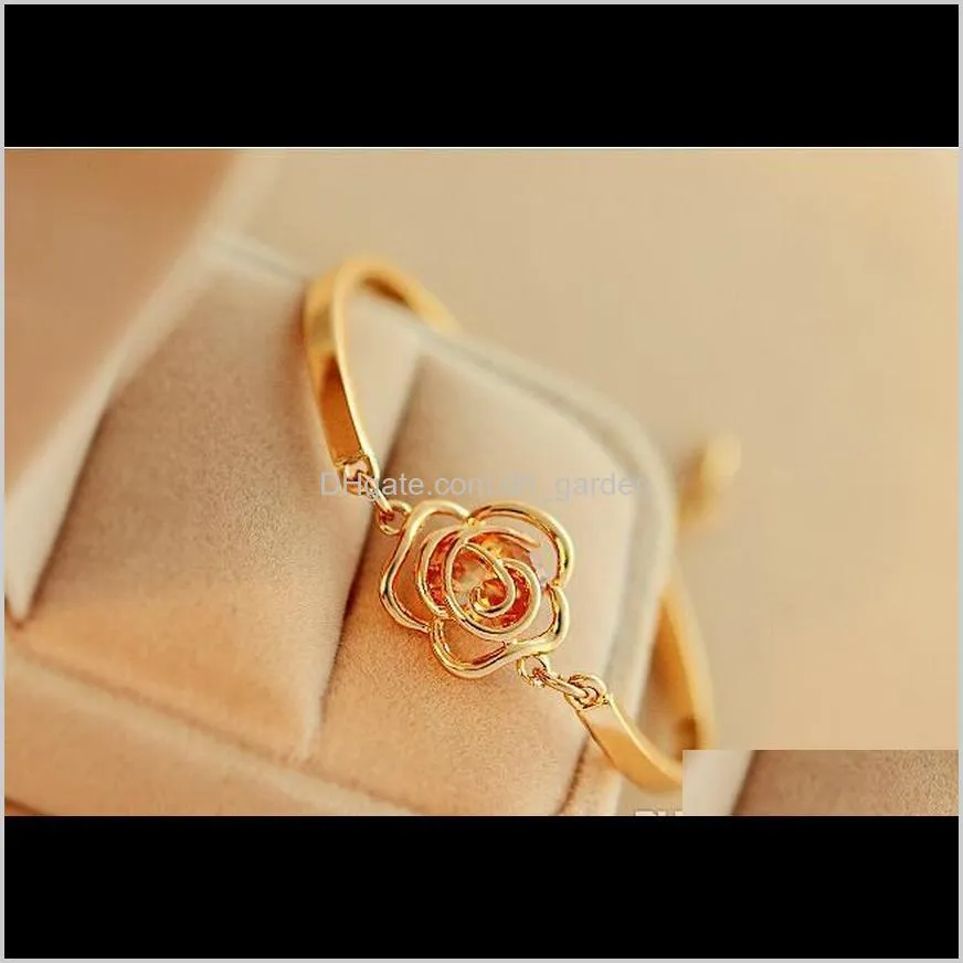 Bracelets Drop Delivery 2021 Fashion Hollow Camellia Flower Rose Crystal Charm Bracelet Gold Plated Cuff Bangles For Woman Wedding Jewelry Og