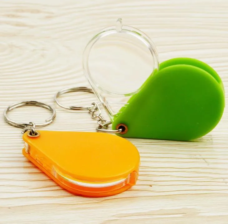 Optical Instruments 10X Magnifying Glass Folding Magnifier Handheld Glass Lens Plastic Portable Keychain Loupe Green Orange SN4835