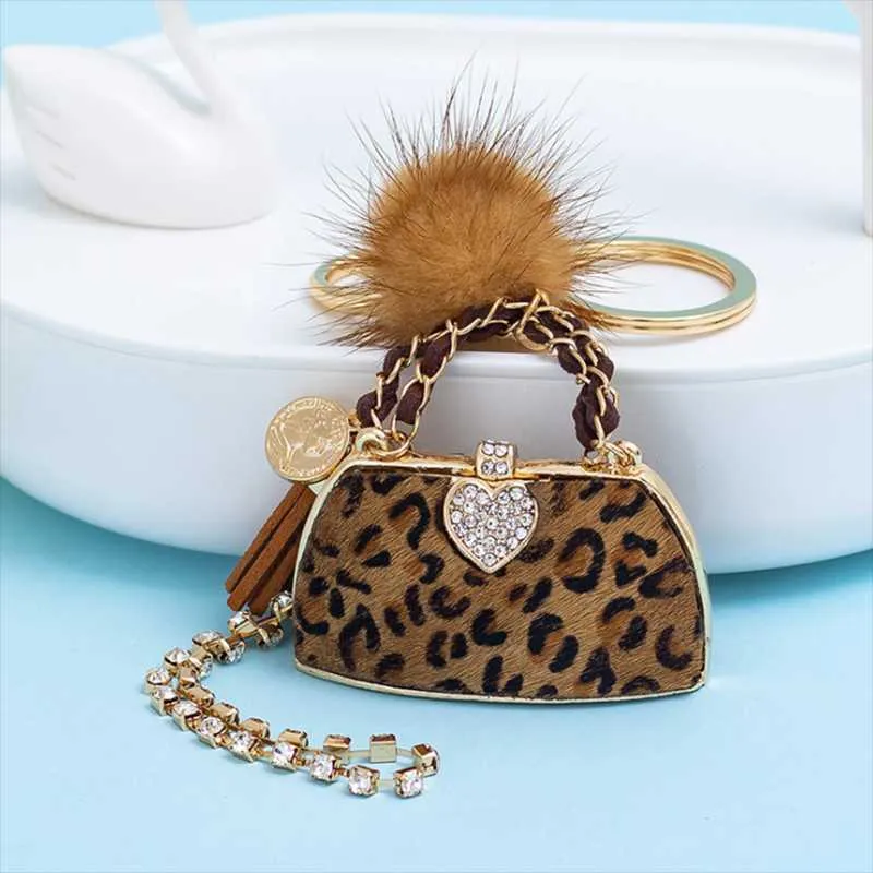 Porte-clés boule de cheveux à la mode, personnalisé, imprimé léopard, chaîne de sac à main pour femmes, breloques de sac exquises, accessoires