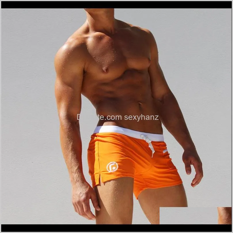 swimwear men sexy swimming trunks sunga swimsuit solid color pocket mens swim wear briefs beach shorts