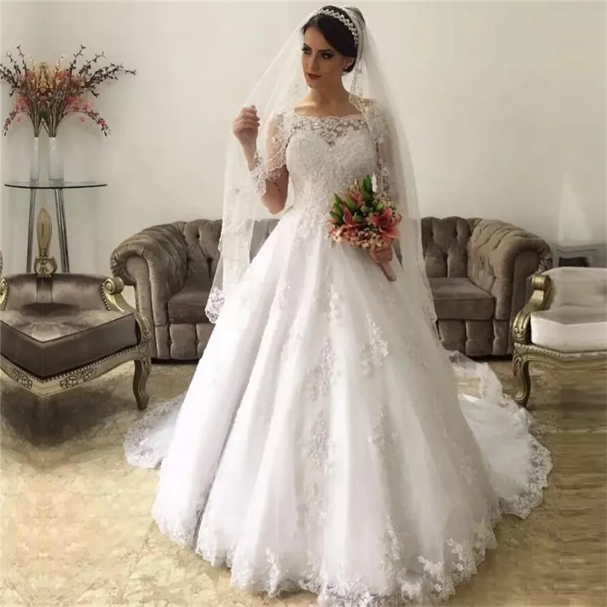 Abiti da sposa in pizzo a maniche lunghe di lusso Corte dei treni Abiti da sposa Bottoni posteriori con perline Vestidos De Noiva 2022 Abito da sposa taglie forti avorio primavera autunno