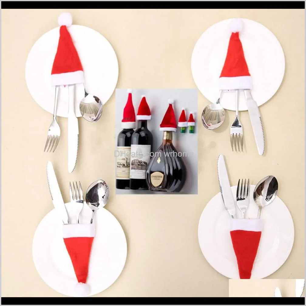 Andra festliga förnödenheter Hem Gardenchristmas Santa Claus Decoration Knife and Fork Set Beer Bottle Wrap Hat Candy Presentväska för bröllopsdel