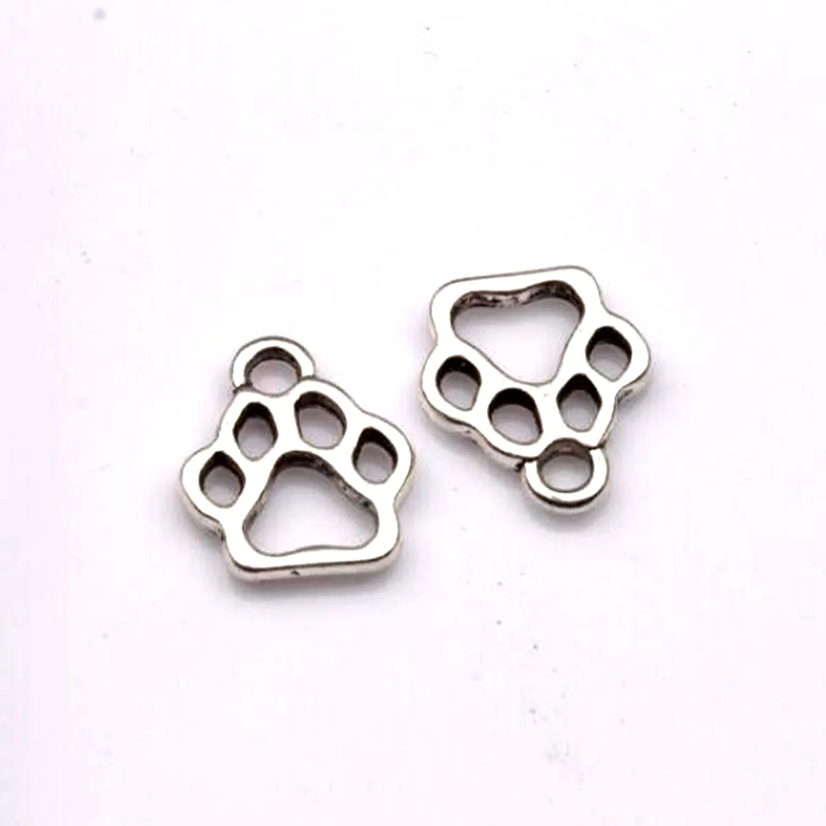 500st -legering Hollow Dog Paw Charm Pendant för smycken som tillverkar armband halsband DIY -tillbehör 11x13mm antik silver