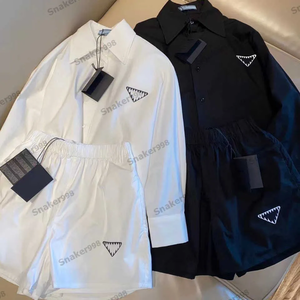 Designermärke Dam träningsoveraller Damstil inverterad triangelkrage sju fjärdedels ärm skjorta lösa shorts Casual Suit Dam Silk