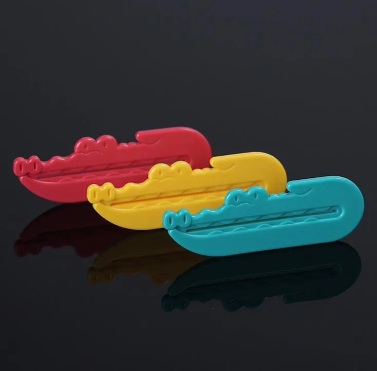 Plastica Dentifricio-Spremiagrumi Accessori per il bagno Detergente per il viso Dentifricio Tubo Rolling Press Squeezer Dispenser SN3003